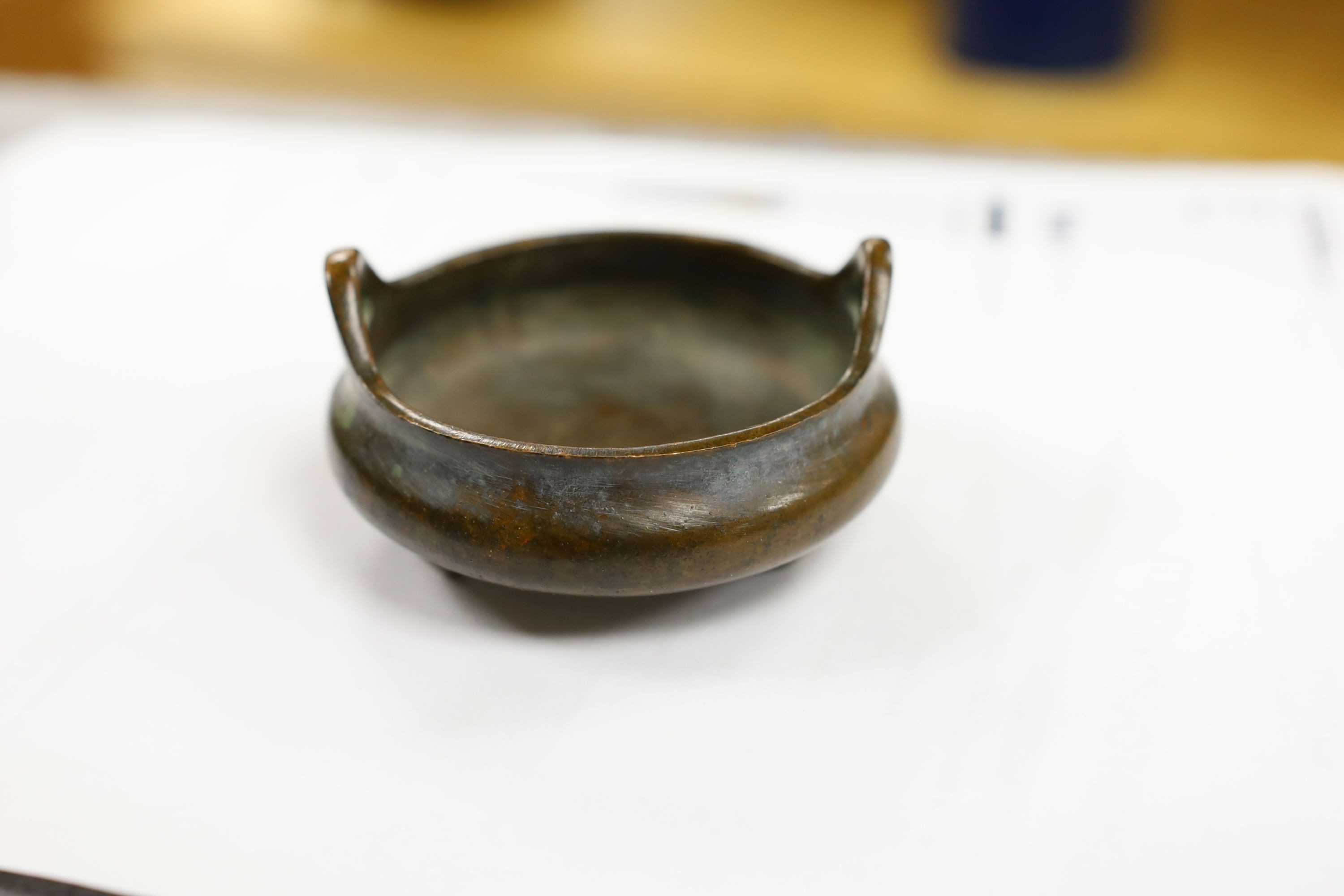 Two Chinese bronze censers, largest 11cms diameter